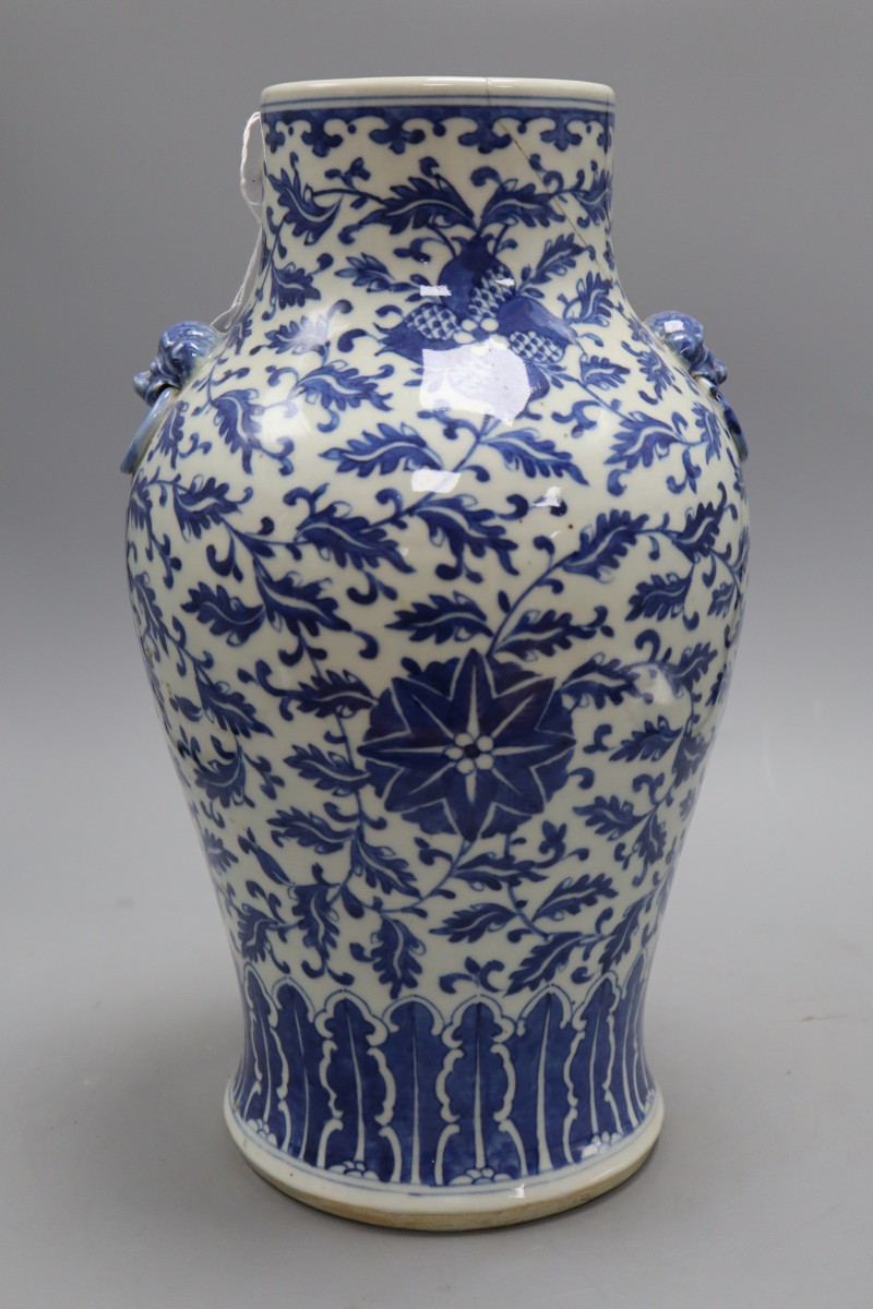 A Chinese blue and white vase, height 39cm (damaged)